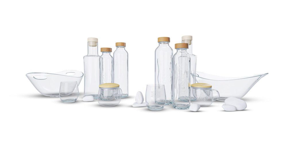 Clean glass bottles and pitcher reflecting natural purity in Flaska’s Pure Collection banner