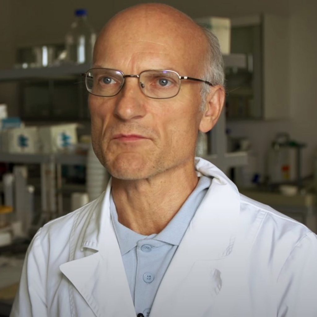 Scientist from BION Institute testing structured water in Flaska glass bottle using Evapo method to analyze internal water structure and vibrational effects