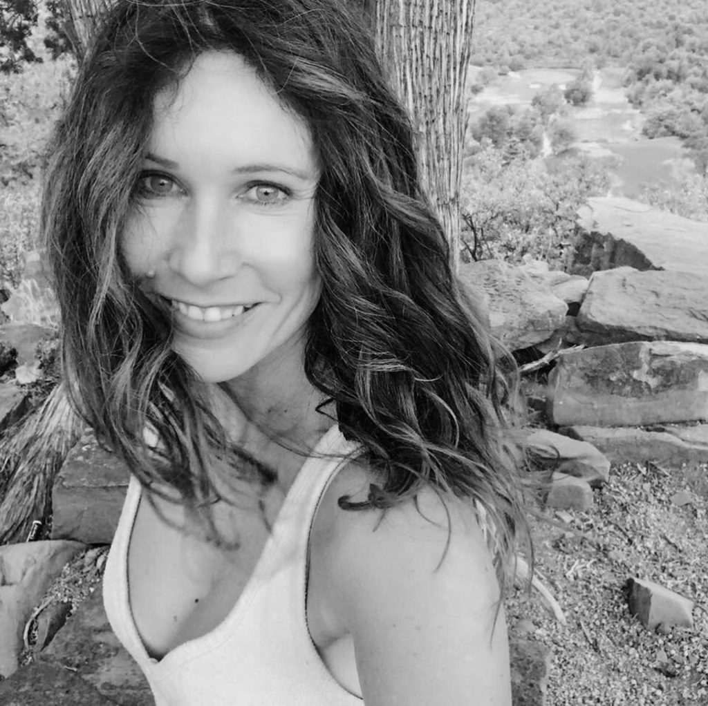 Veda Austin, water researcher and artist known for exploring water consciousness and visualizing structured water responses through intention and sound